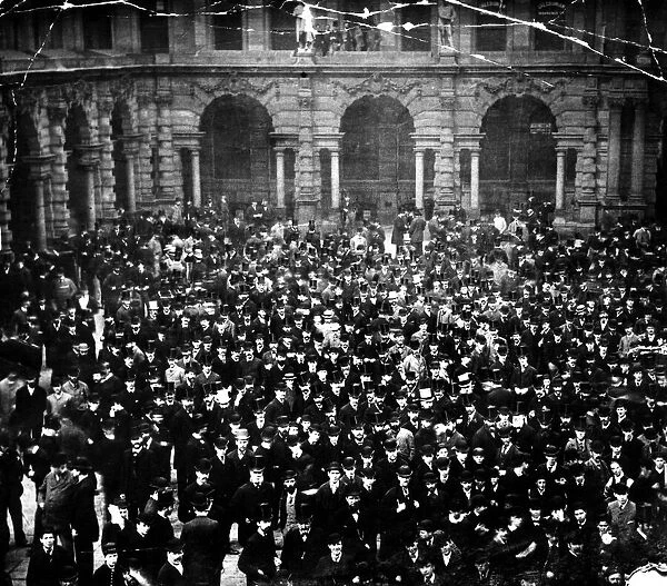 Crowds gather at the Liverpool Cotton Exchange. Circa 1910