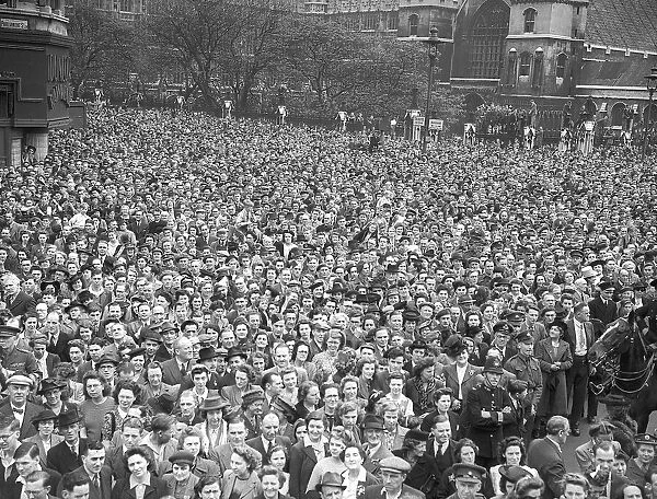 Crowds gather in London for VE day celebrations after the announcement that WW2 in Europe