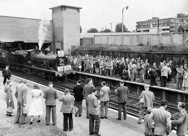 Crowds gather for the last train from Crystal Palace to Richmond, in September, 1954