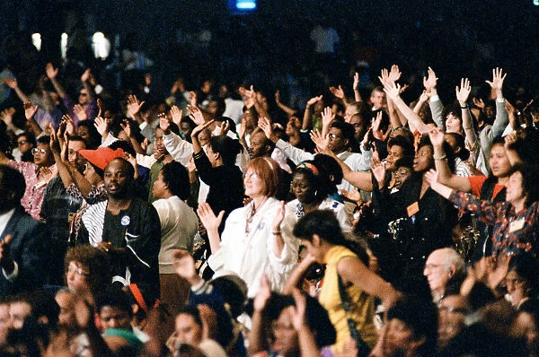 Crowds listening to Maurice Cerullo, an American pentecostal televangelist during his