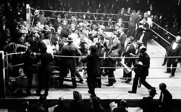Crowds mob Jimmy Wilde at the end of his fight with Pal Moore after he had beaten