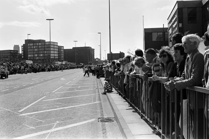 Framed Print : Crowds of people line the dock road set for a day out at Liverpool Albert Dock to see