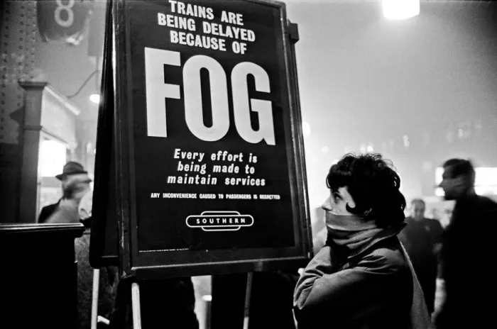 Framed Print : Crowds of people waiting at Waterloo station as trains are delayed due to fog Framed Print : Crowds of people waiting at Waterloo station as trains are delayed due to fog