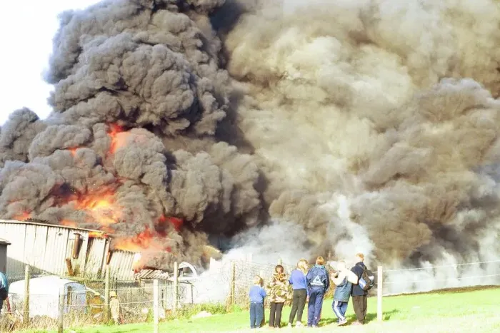 Framed Print : Crowds watch the smoke billow from a fire at Swalwell