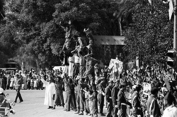 Crowds watching the Royal procession in Marrakesh, Morocco. 28th October 1980