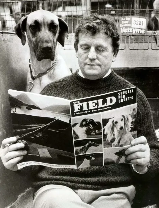 Framed Print : Crufts Dog show opened this morning in Olympia, London. Competitor Thomas Humphrey checks Framed Print : Crufts Dog show opened this morning in Olympia, London. Competitor Thomas Humphrey checks