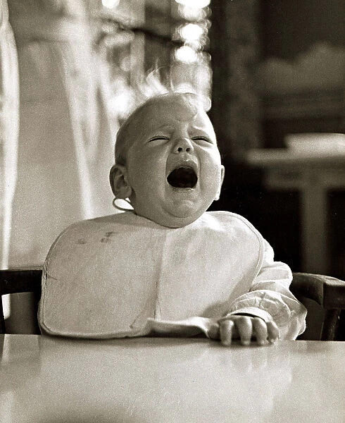 Crying baby with mouth open 1947