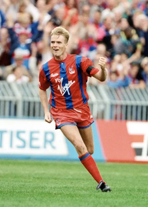 Framed Print : Crystal Palace footballer Geoff Thomas celebrates after scoring a goal in the league