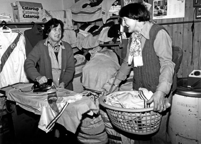 Framed Print : Crystal Palace laundry ladies prepare the shirts before a game against Manchester United