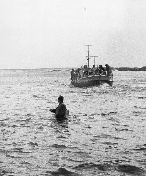 The Cullercoat lifeboat is launched. The Sir James Knott