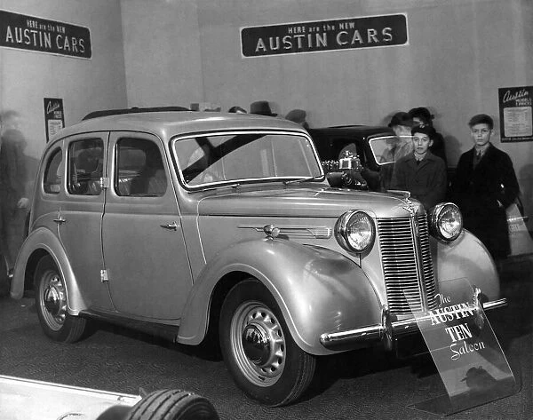 Customers looking at an Austin A10 car in a showroom. January 1946 P005748