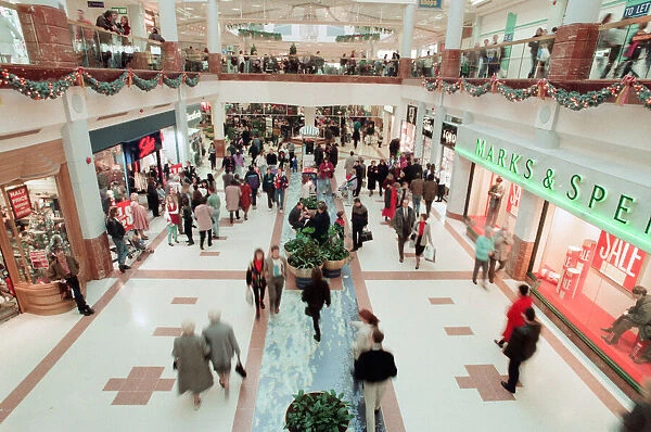 Customers pack Merry Hill Shopping Centre in Brierley Hill, first day of Christmas Sales