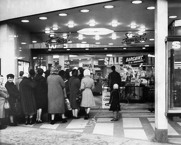 Customers queue for the start of the Fenwicks sale in Newcastle
