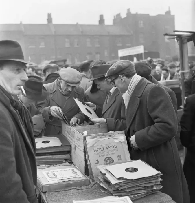 Framed Print : Customers at the secondhand gramophone record stall at the flea market in Club Row Framed Print : Customers at the secondhand gramophone record stall at the flea market in Club Row