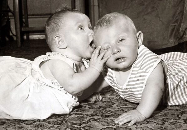Two cute babies, circa 1950