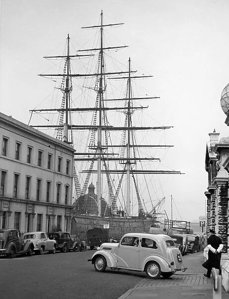 The Cutty Sark in her dry dock at Greenwich. Preparations for her to become a