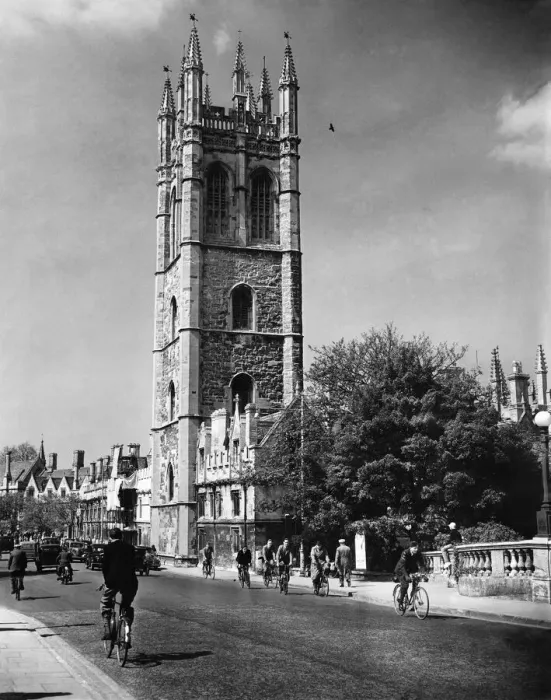 Framed Print : Cyclist in High Street, Oxford, cycling past Magdalen College, Oxfordshire Framed Print : Cyclist in High Street, Oxford, cycling past Magdalen College, Oxfordshire