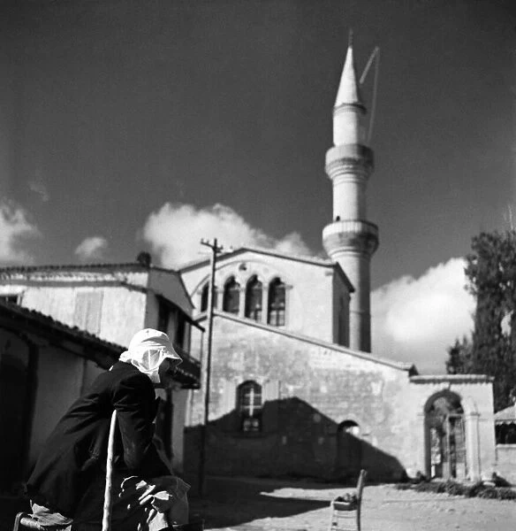 Cypriot Turk outside a Mosque in Cyprus. November 1952 C1103-010