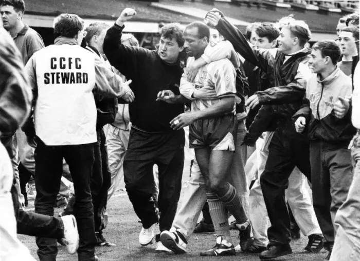 Framed Print : Cyrille Regis is surrounded by adoring Sky Blue fans at the end of his last home game for Framed Print : Cyrille Regis is surrounded by adoring Sky Blue fans at the end of his last home game for