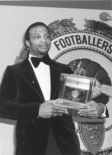 Cyrille Regis with his Young Player of the Year Award. Cyrille pipped his team-mate