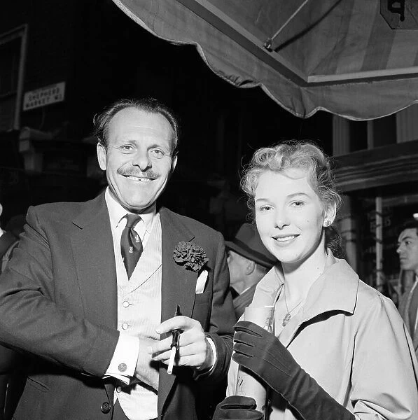 Daily Mirror Debutante, Miss Jill Carter with actor Terry Thomas at the May Fair in