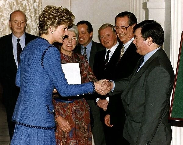 Daily mirror editor Richard Stott shakes hands with Princess Diana. July 1992