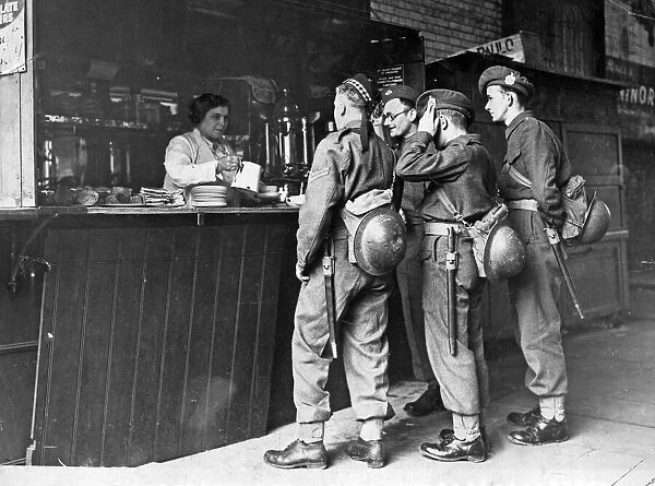 Daisy Green, aged 42, serving tea to soldiers at Waterloo Station, London
