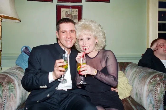 Framed Print : Dale Winton and Barbara Windsor share a nice moment at Dales birthday party