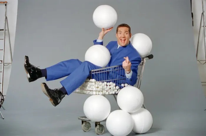 Framed Print : Dale Winton, TV presenter, poses for a studio photoshoot to celebrate his hosting of