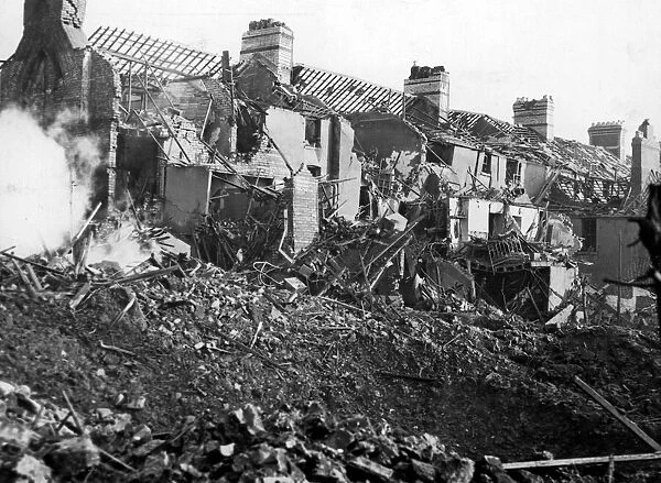 Damage caused to De Burgh Street, Cardiff, following an air-raid attack. Circa 1941