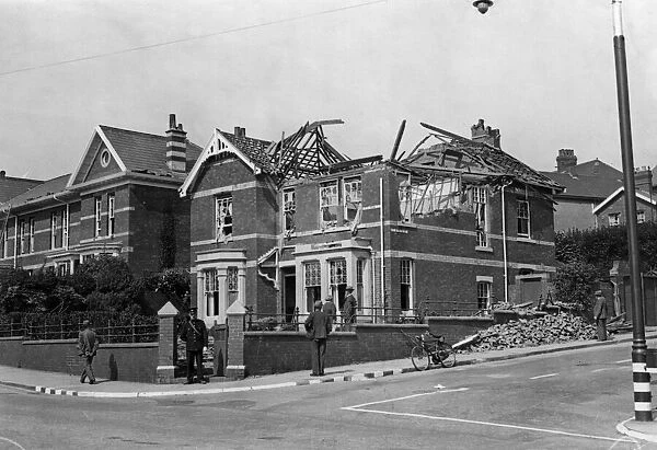 Damage done to a house on Eversley Road, Swansea, following a Nazi raid. February 1941