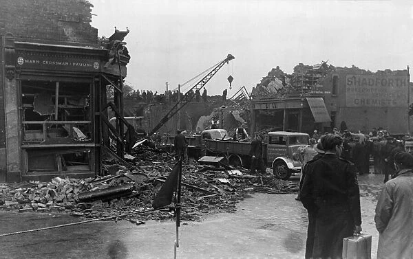 Damage to a residential street in Stepney caused when an enemy aircraft crashed