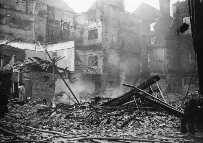 Framed Print : Damage to shops and houses in a West Midlands town following an air raid during Framed Print : Damage to shops and houses in a West Midlands town following an air raid during