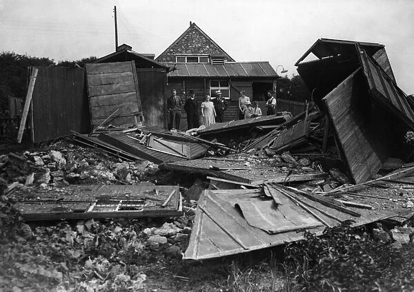 Damage in a Welsh rural district when a bomb dropped on a stable. Circa 1941