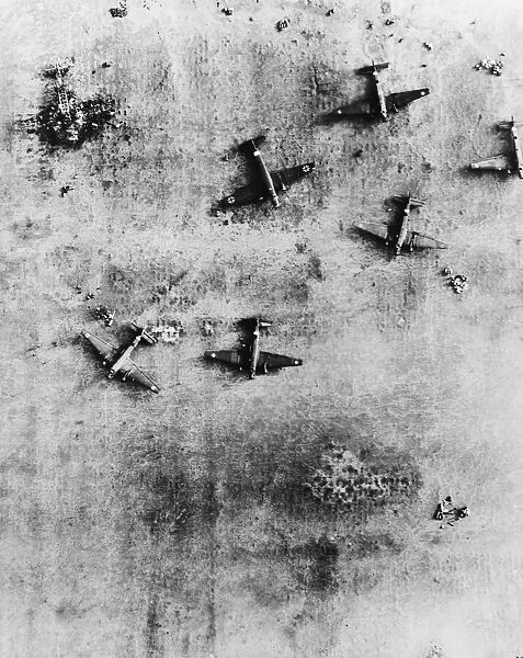 Damaged and destroyed German planes in the desert during the Second World War