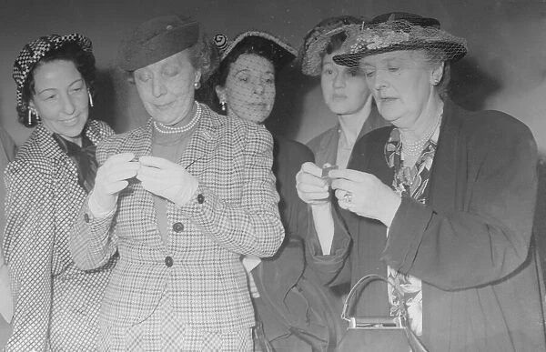 Dame Edith Evans and Dame Sybil Thorndike seen here being presented with silver emblems