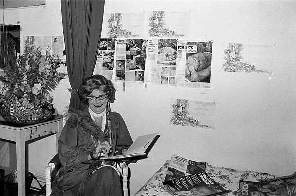 Dame Edna Everage (aka Barry Humphries) in her dressing room. 17th July 1976