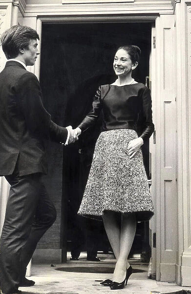 Dame Margot Fonteyn says goodbye to Rudolph Nureyev at the door of her Hammersmith home