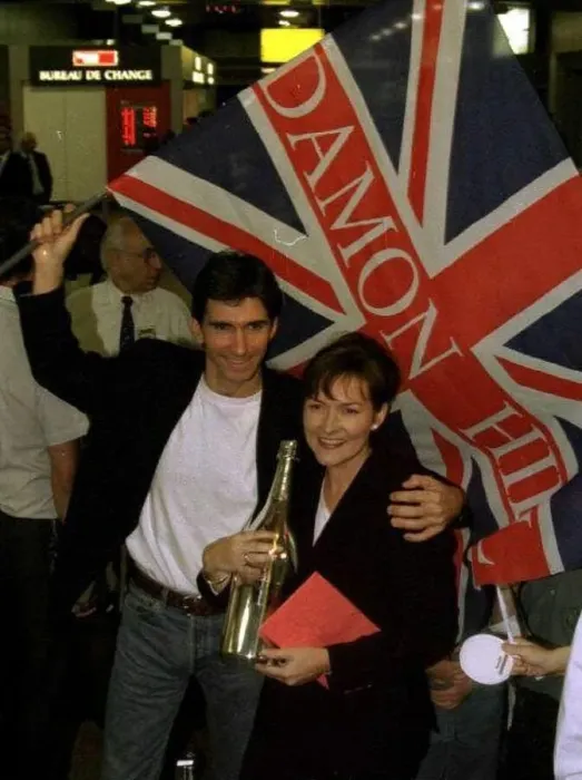 : Damon Hill Arrives At Heathrow With His Wife Georgie After His Winning The Formula One : Damon Hill Arrives At Heathrow With His Wife Georgie After His Winning The Formula One