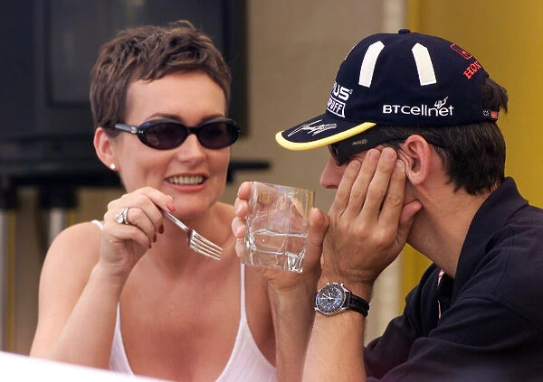 Damon Hill ponders his future with wife Georgie July 1999 over lunch in the Jordan motor