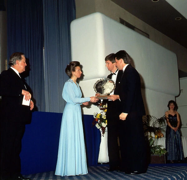 Dan Travers receives award from Princess Anne January 1987