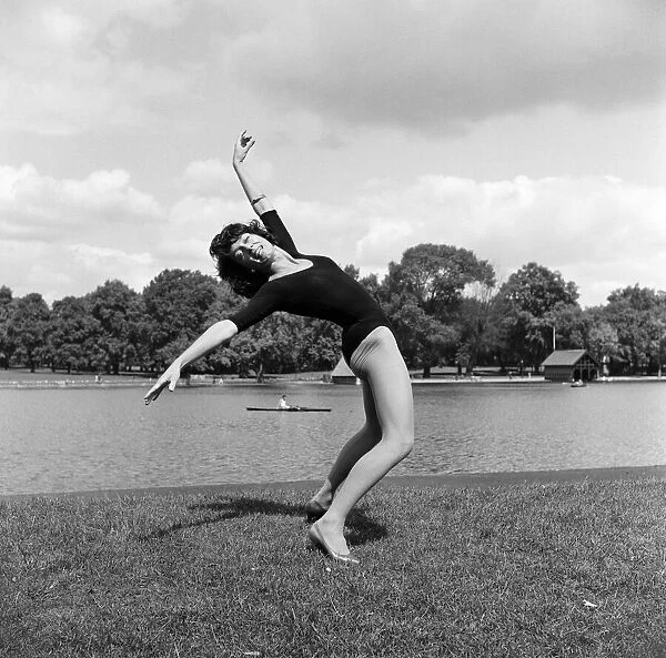 Dancer Gillian Lynne has her own idea of a sitting position whilst taking the sun at