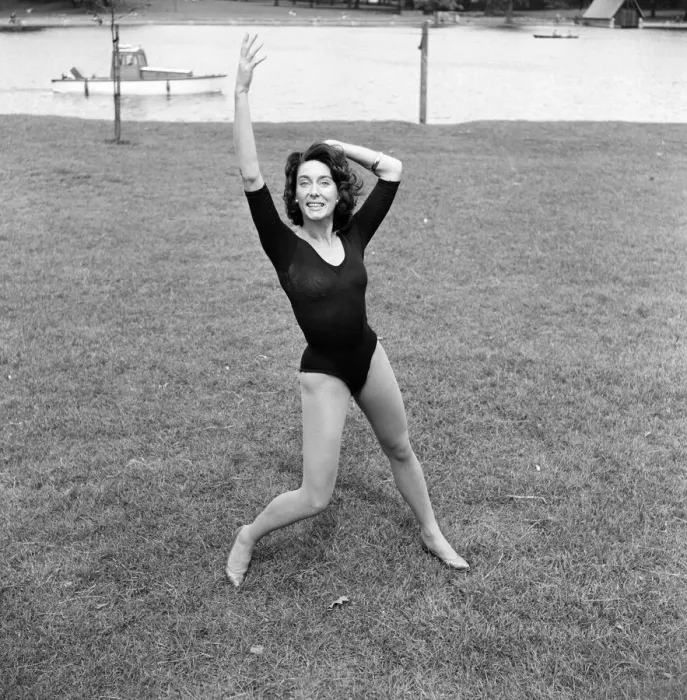 Framed Print : Dancer Gillian Lynne has her own idea of a sitting position whilst taking the sun Framed Print : Dancer Gillian Lynne has her own idea of a sitting position whilst taking the sun