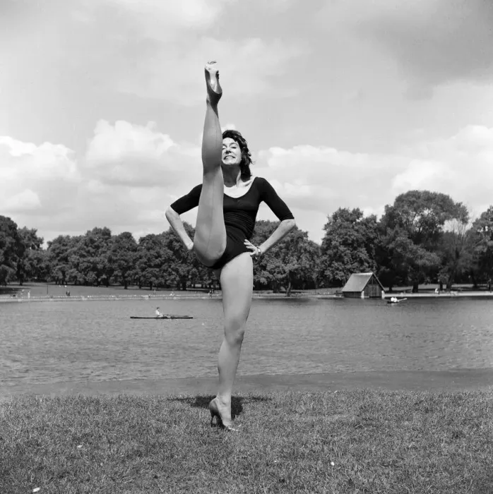 Framed Print : Dancer Gillian Lynne has her own idea of a sitting position whilst taking the sun Framed Print : Dancer Gillian Lynne has her own idea of a sitting position whilst taking the sun