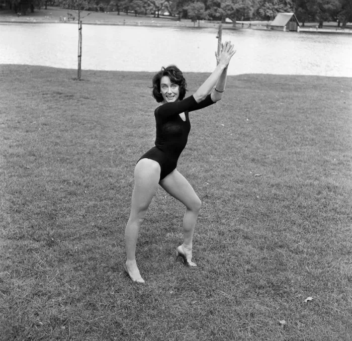 Framed Print : Dancer Gillian Lynne has her own idea of a sitting position whilst taking the sun Framed Print : Dancer Gillian Lynne has her own idea of a sitting position whilst taking the sun