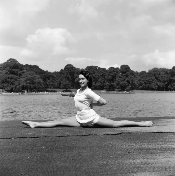 Framed Print : Dancer Gillian Lynne has her own idea of a sitting position whilst taking the sun Framed Print : Dancer Gillian Lynne has her own idea of a sitting position whilst taking the sun