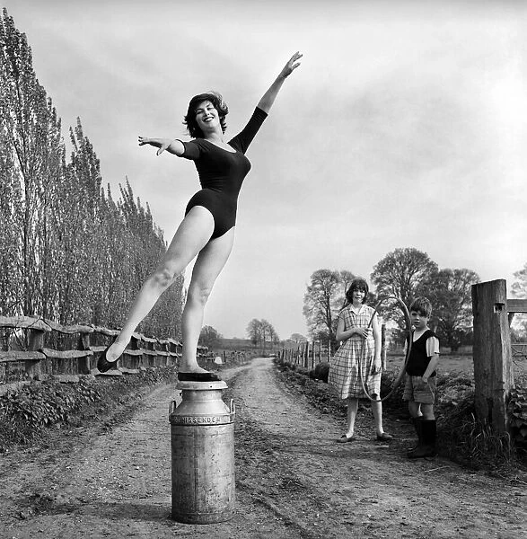 Dancing on the farm Ballerina Gillian Brodie seen here performing on fence posts
