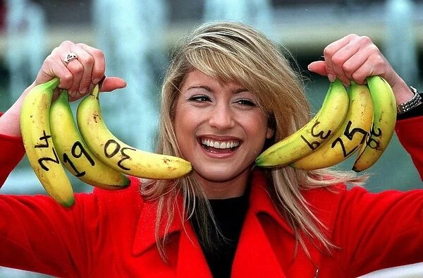 Dani Behr TV Presenter - numbers on bananas for her Lottery Show