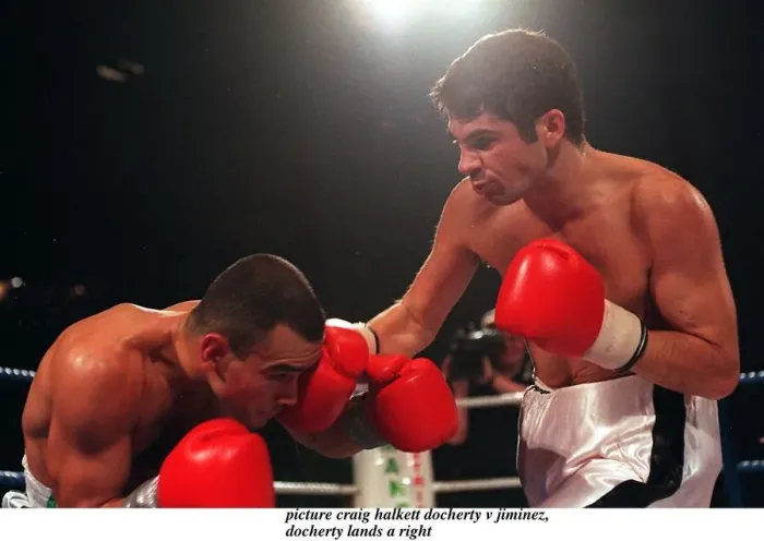 Framed Print : Daniel Jiminez of Puerto Rico and Drew Docherty of Scotland in action during their WBO