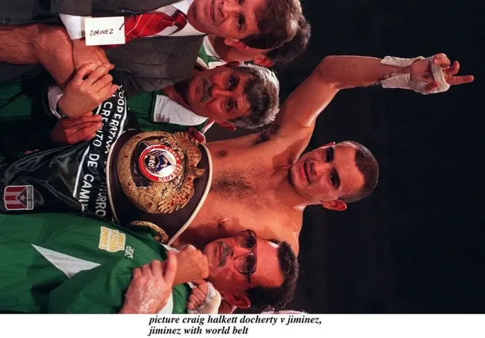 Framed Print : Daniel Jiminez with world belt and corner men trainers after holding on to WBO boxing Framed Print : Daniel Jiminez with world belt and corner men trainers after holding on to WBO boxing